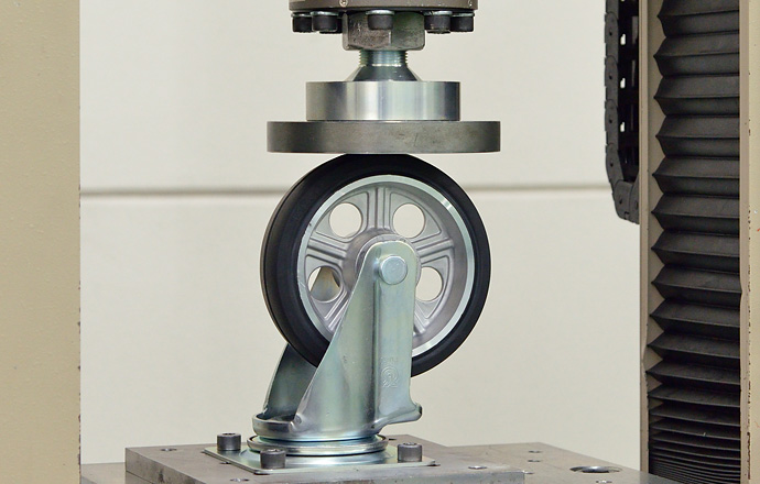 Universal tensile and compression stress testing machine